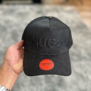 HUGO Black Cap with Bold Orange Emblem Unisex